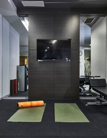 Fitness center with smartphone connectivity and individual LCD screen technology